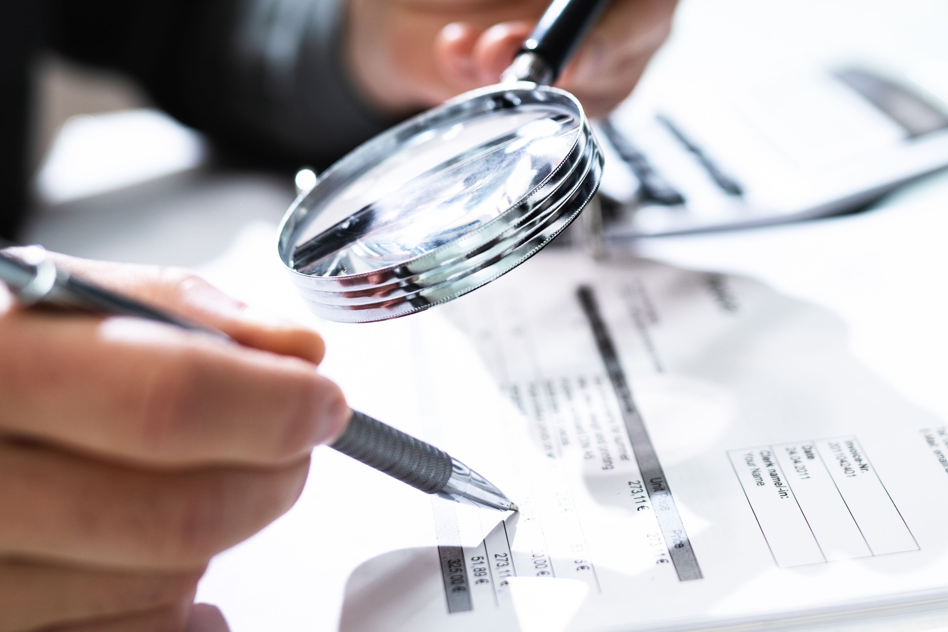 Audit And Fraud Investigation. Auditor Using Magnifying Glass