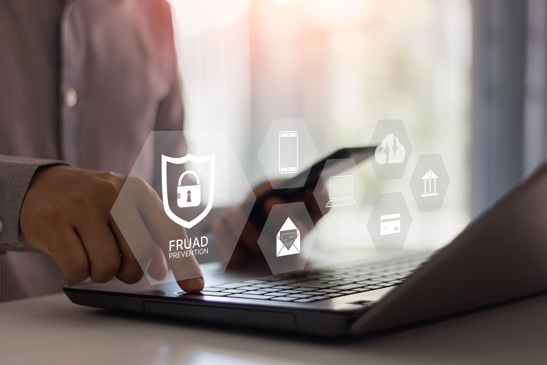 Fraud prevention button, concept about cybersecurity, credit card and identity protection against cyberattack and online thieves, phishing scam, mobile phone hacker, bank account threat and fraud.